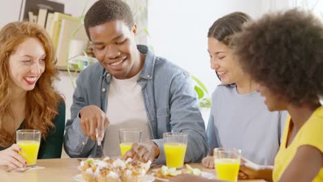 diverse group of friends enjoying a casual meal and conversation