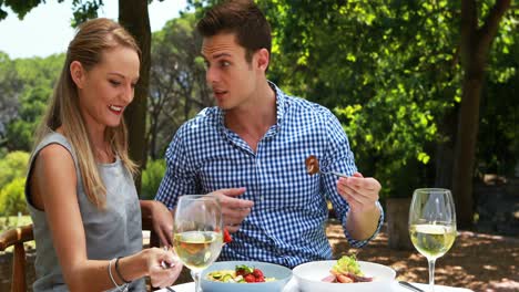 Couple-having-food-in-outdoor-restaurant-4k