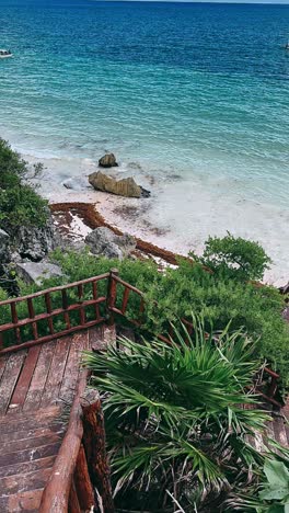 beautiful tropical beach with wooden stairs