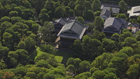 kyoto japan aerial v35 zoomed birds eye view drone fly around sumitomo yuhoen capturing exquisite traditional japanese estate surrounded by lush greenery - shot with mavic 3 pro cine - oct 7th 2023