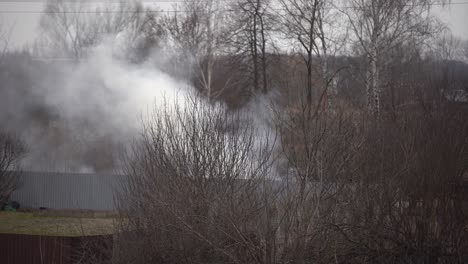 fire-in-the-courtyard-of-a-private-house.-aerial-shooting