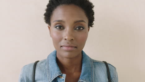 close-up-portrait-of-trendy-african-american-woman-looking-serious-pensive-at-camera