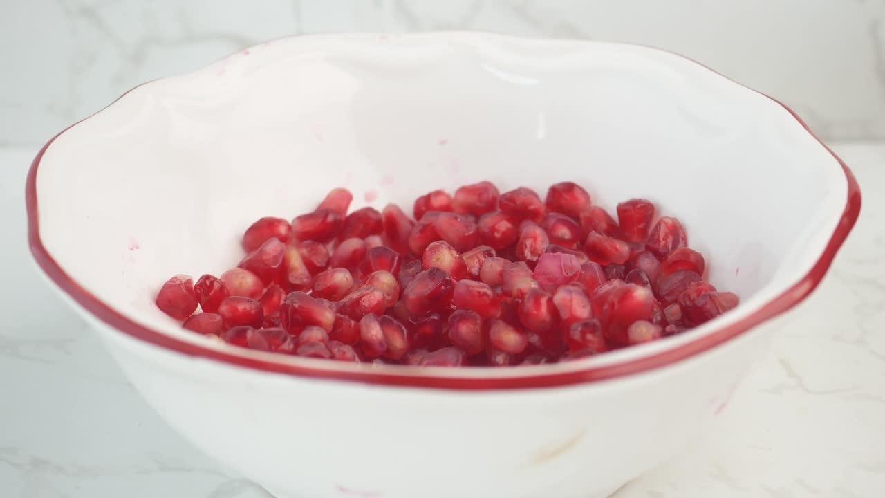 Pomegranate Seeds in a Bowl