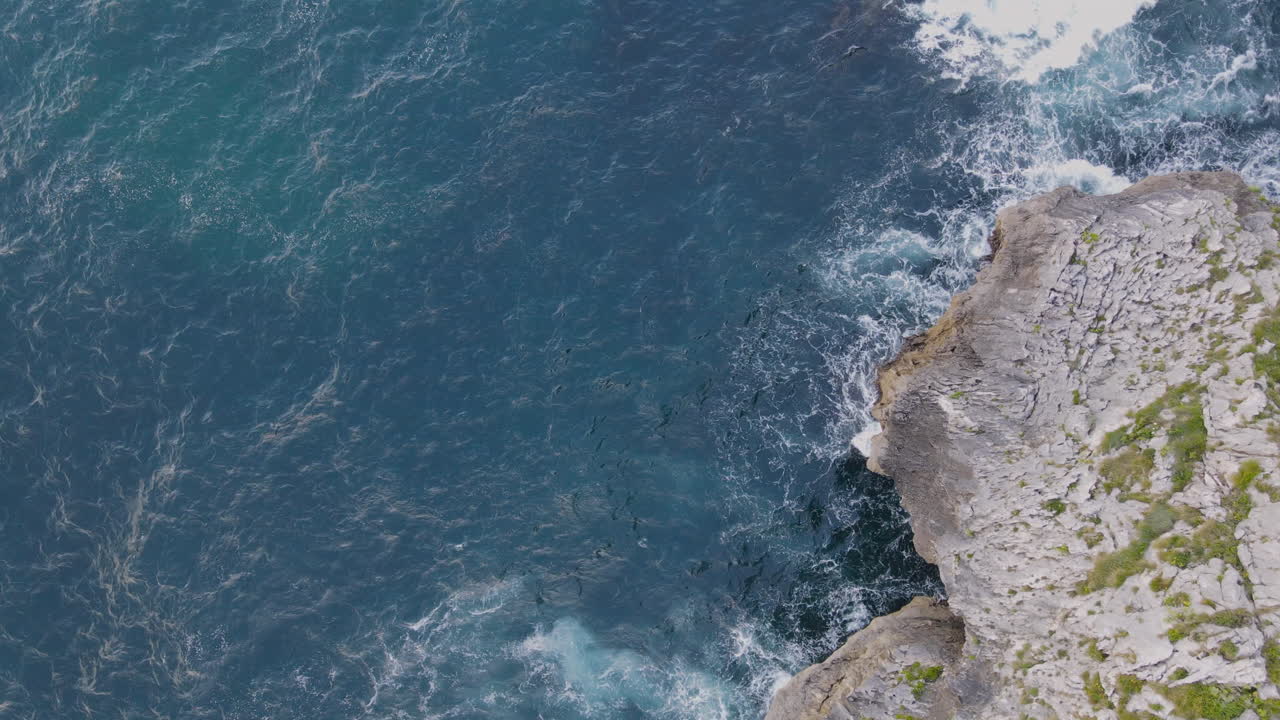 Aerial View Of Sea Waves Breaking On Rocky Coastline 1