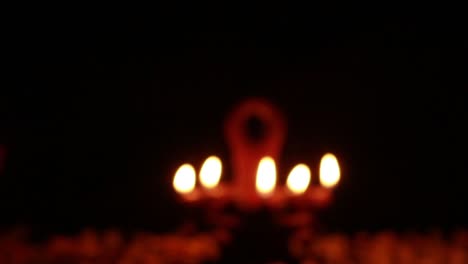 celebration of festival of lights by lighting mud lamps
