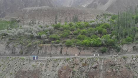 aerial dolly back view from roadside cliff in gilgit in pakistan