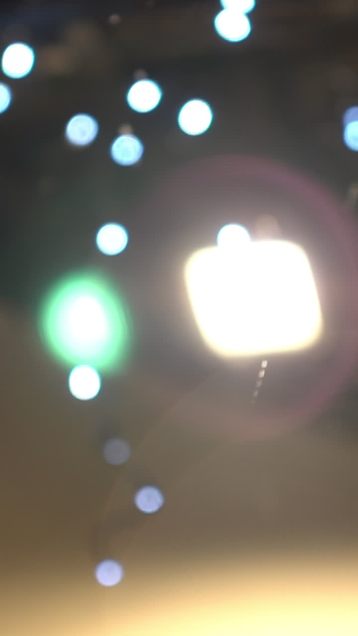 Blurred image of string lights and ceiling light