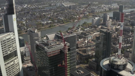 Skyscraper-Tower-under-construction-in-Frankfurt-am-Main,-Germany-Skyline,-Aerial-wide-angle-view