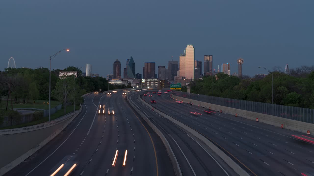 Dallas Skyline at Dusk with Highway Traffic
