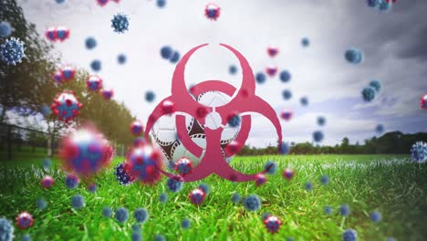 biohazard symbol and covid-19 cells against soccer ball on sports field