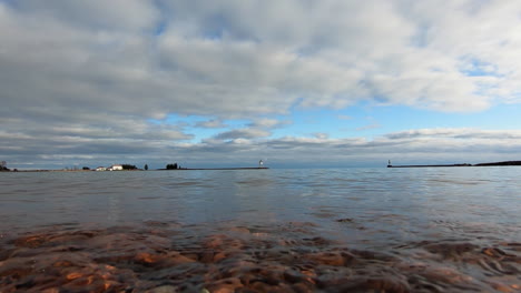 Water-lapping-on-the-shore-of-Lake-Superior-in-Grand-Marais,-Minnesota