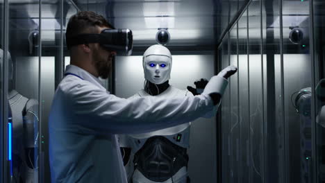 scientist interacts with a robot in a server room