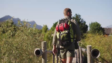 caucasian man hiking in nature