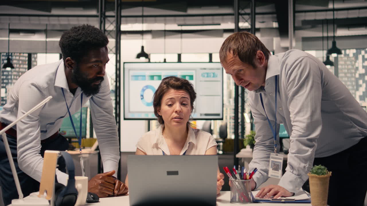 Diverse corporate team, meeting focused on strategy, planning and visual data,