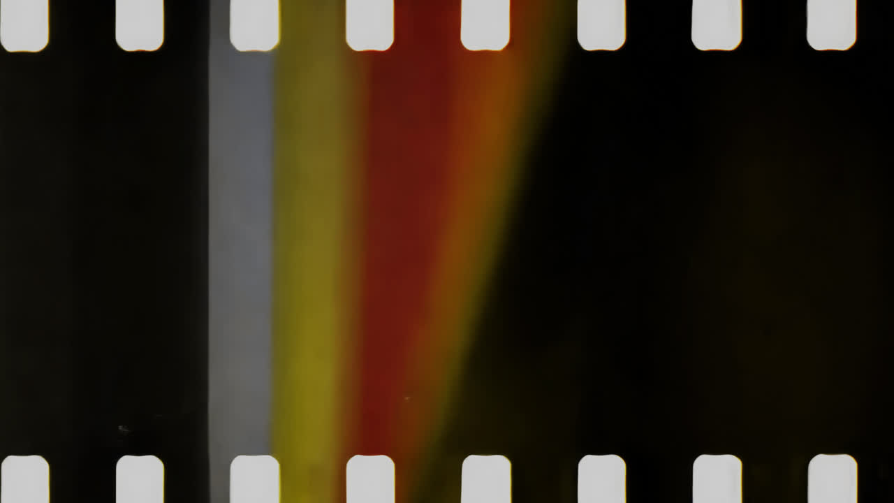 Vintage filmstrip with colorful gradient animated overlay, transparent 4K video, alpha channel