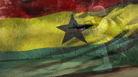 animation of flag of ghana over caucasian male soldier with rifle