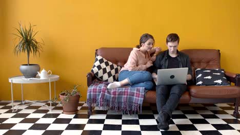 couple working together on laptop