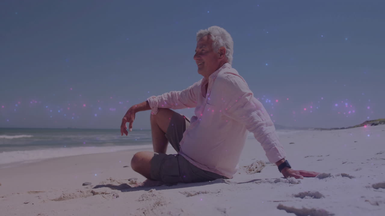 senior man relaxing on sandy beach, with animated health tech icons floating above smartwatch