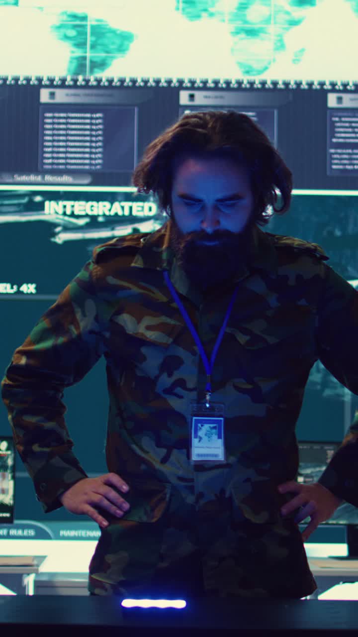 Bearded Man in Camouflage Interacting with Holographic Interface