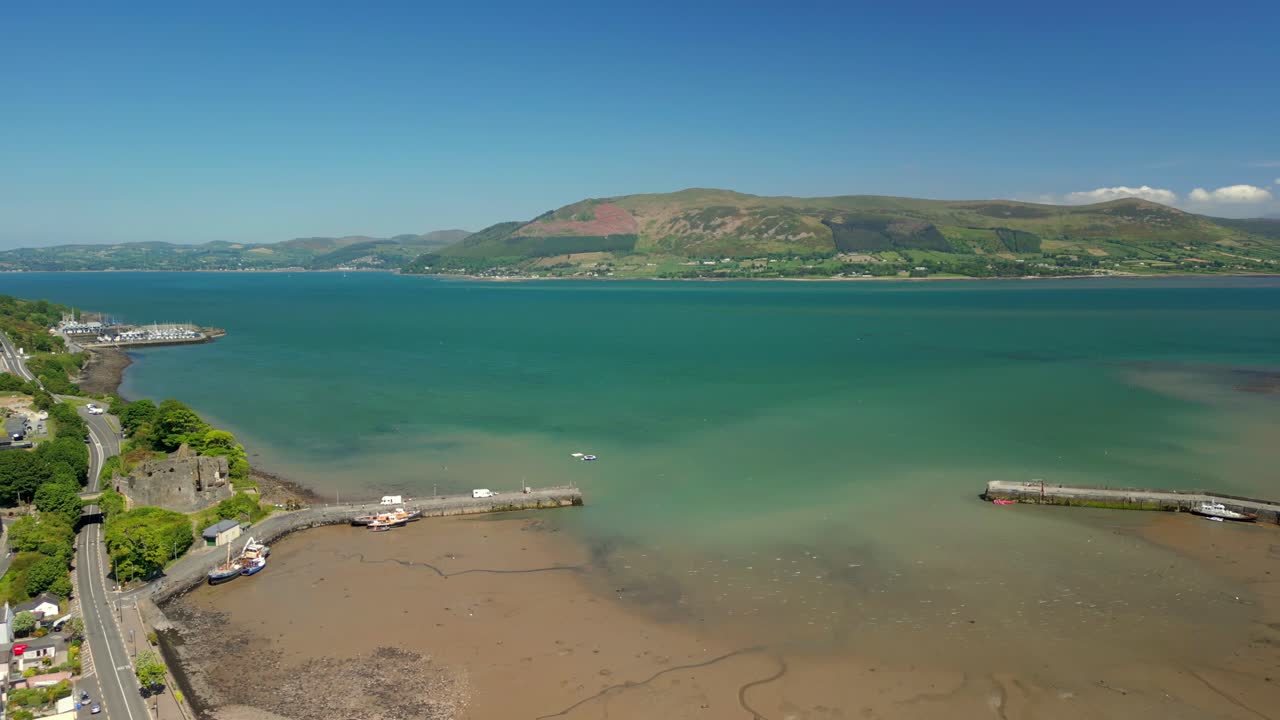 Ultra-wide aerial video of Carlingford, County Louth, Ireland on a bright and sunny day. Filmed in 4K, 60FPS and with Rec709 color.