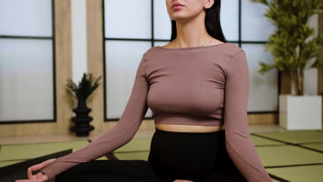 woman doing yoga indoors