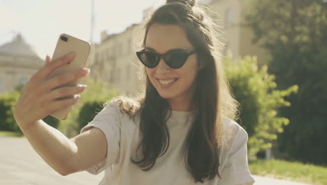 woman taking a selfie outdoors