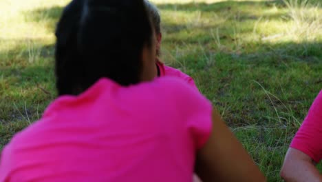 Group-of-women-interacting-with-each-other-during-obstacle-course