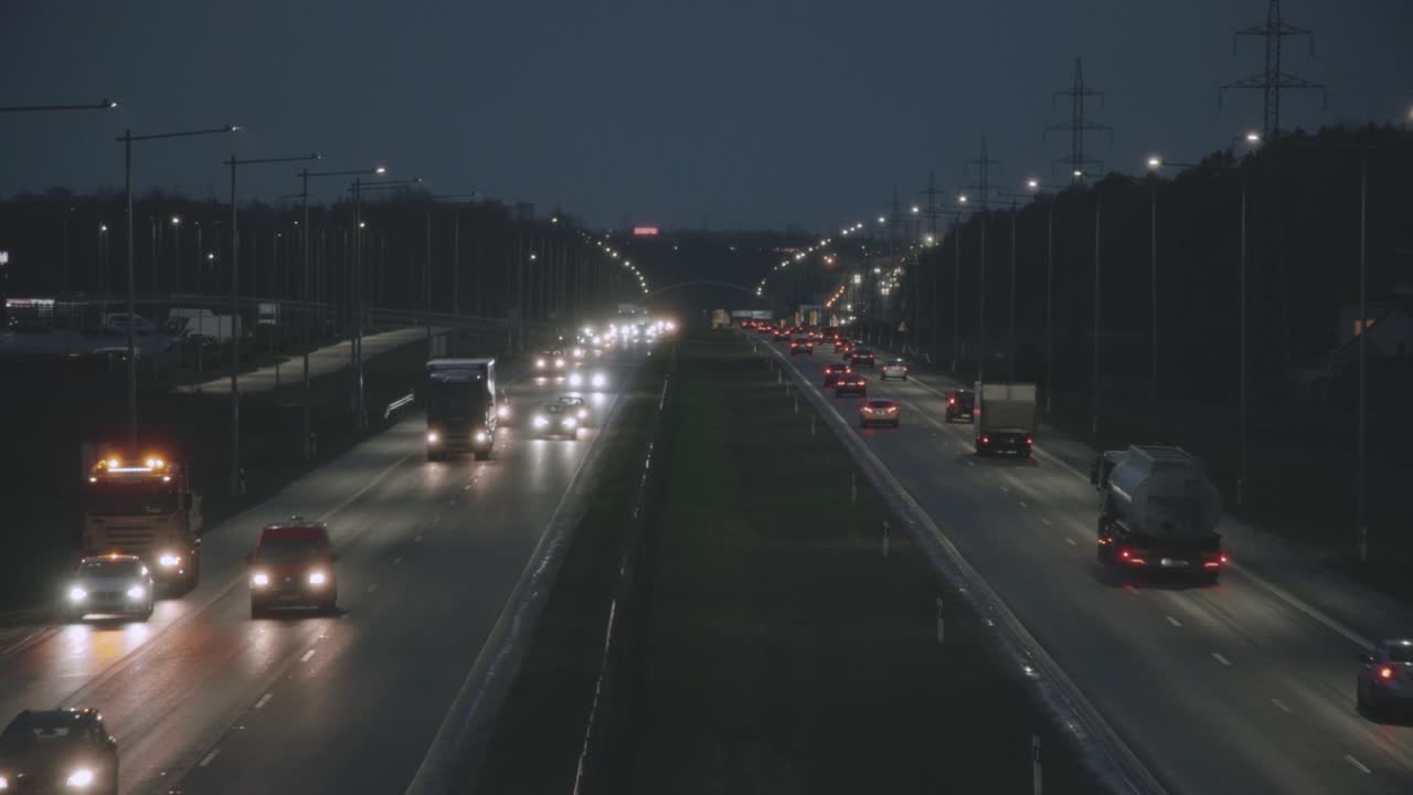 Cars in city bypass at night