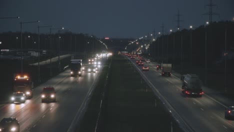 cars in city bypass at night