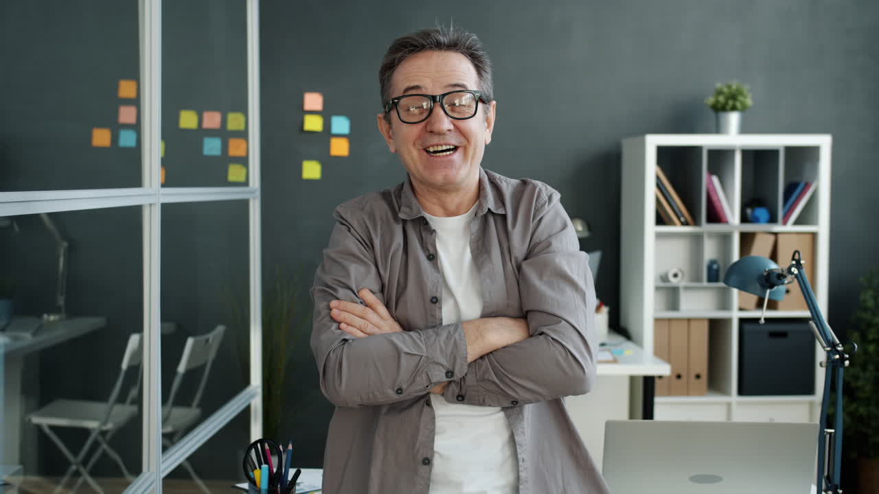 Smiling Business Man in Modern Office