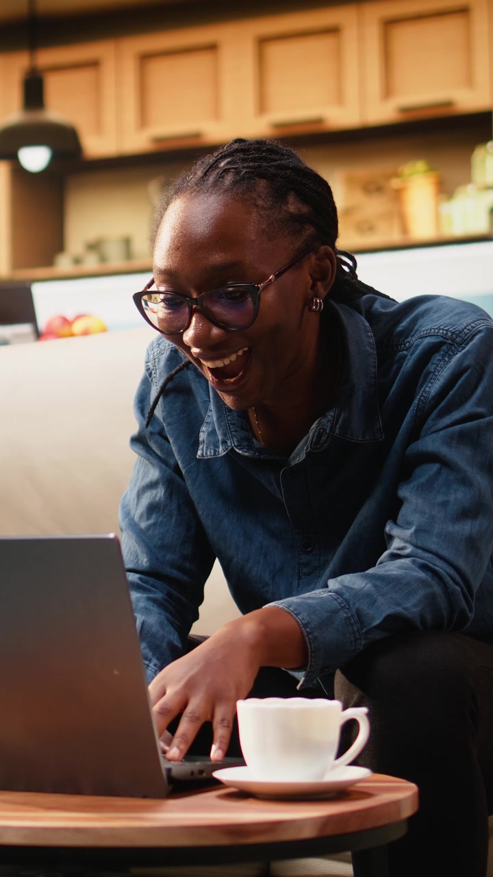 Vertical Video Overjoyed woman excited about career good news and remote work reward