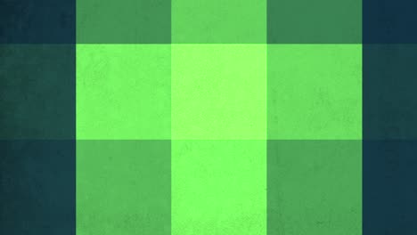 vibrant green and blue pattern on dark background grid of rectangles