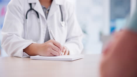 Doctor,-hands-and-writing-notes-in-patient