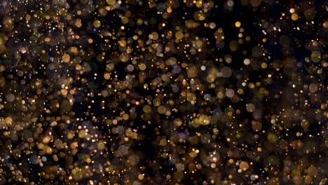 elegant, detailed, and golden particles flow with shallow depth of field underwater
