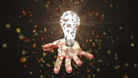 hand reaching out, light bulb and particles animation floating above