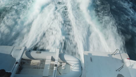 view from stern of high speed ferry of a turbulent water trail