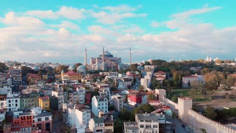 Distant-View-Of-The-Famous-Hagia-Sophia-Grand-Mosque-In-Istanbul,-Turkey-On-A-Sunny-Afternoon---wide-aerial-shot