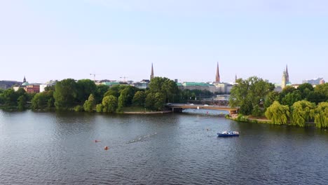 Aerial-view-of-the-outer-alster-lake-with-swimmmers-during-Ironman-in-Hamburg