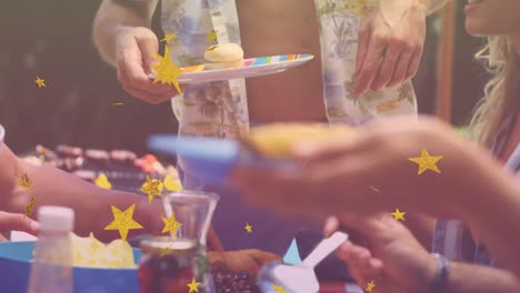 animation of stars over group of caucasian friends having bbq and talking