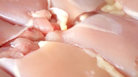 close up of raw chicken breast fillets