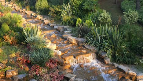 beautiful water feature in a well-landscaped garden