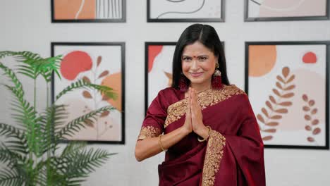 indian woman doing namaste