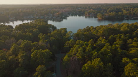 aerial views of a lake at sunset in north carolina