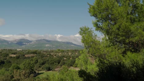 Beautiful-distant-view-of-Parnitha-mountain-,-located-at-Athens,-Greece,-sunny-autumn-day-of-October-2020,-120fps-pan-shot