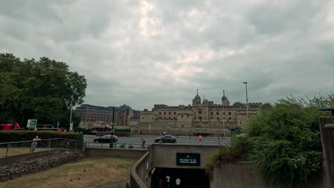 people walking near iconic london architecture