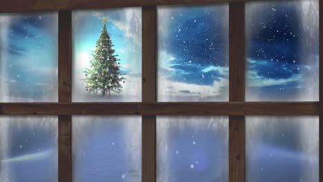 Wooden window frame against snow falling over christmas tree on winter landscape
