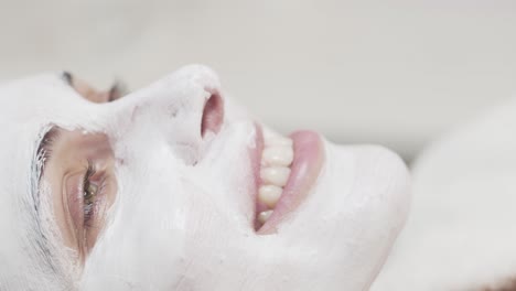 girl enjoying day at spa with face mask on