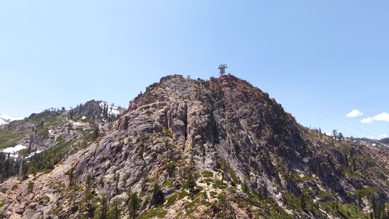 Palisades Tahoe Ski Resort, California USA. Drone Shot of Hilltop Tower For Aerial Tram Gondola Lift
