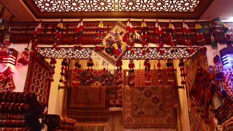 vibrant traditional afghan carpet, detailed shot of a richly patterned, colorful traditional carpet from afghanistan.