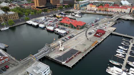 Sydney-to-Hobart,-Constitution-Dock,-Hobart-waterfront,-floating-food-outlets-,-Hobart-City,-Drone-view